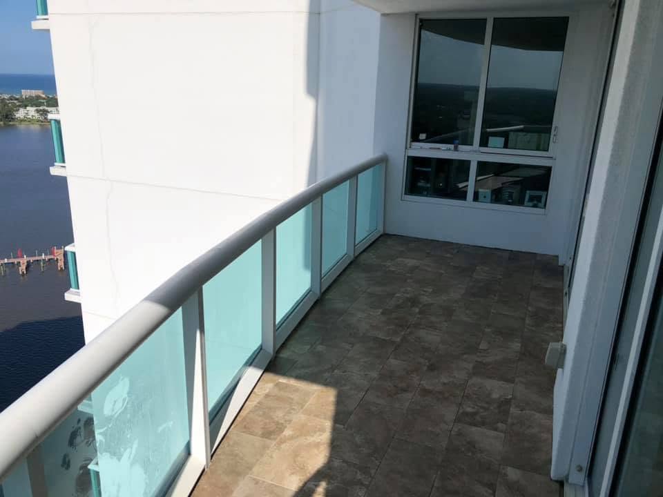 After: tiled waterfront balcony