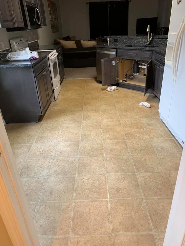 Before: outdated kitchen tile floor