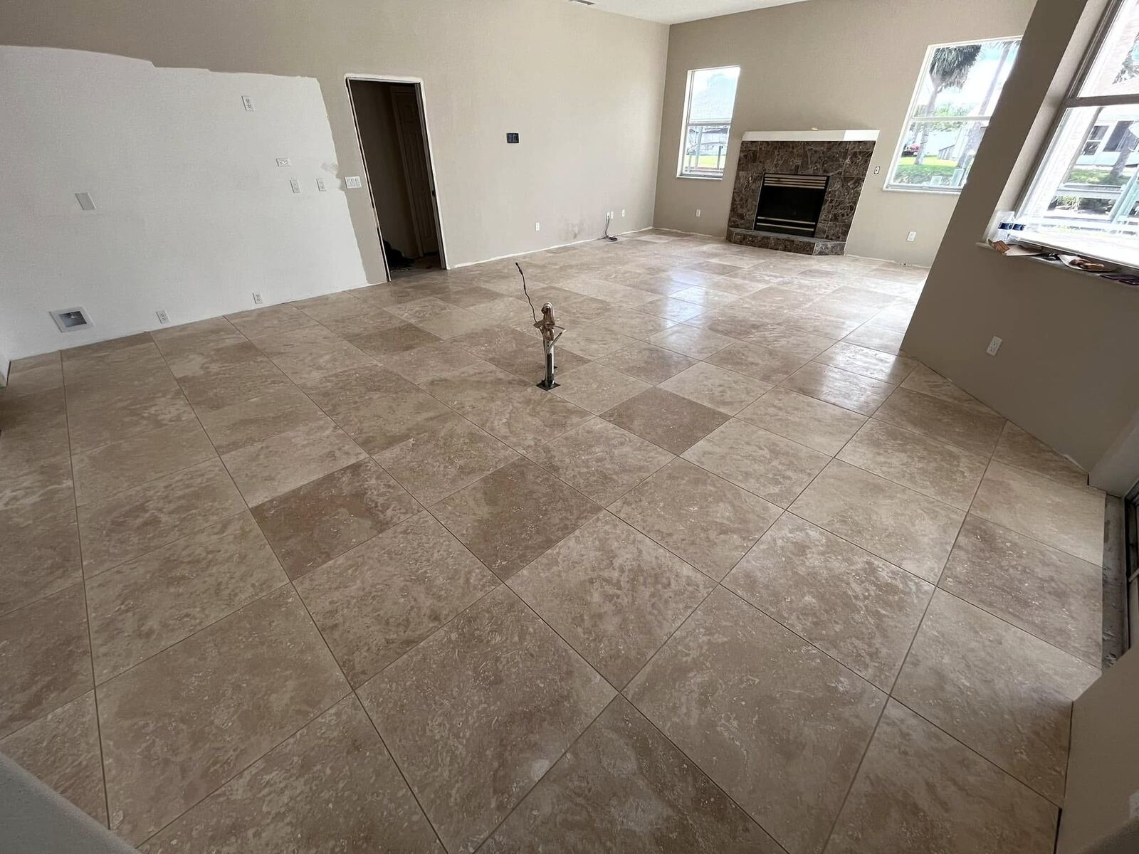Large-format tile flooring installation