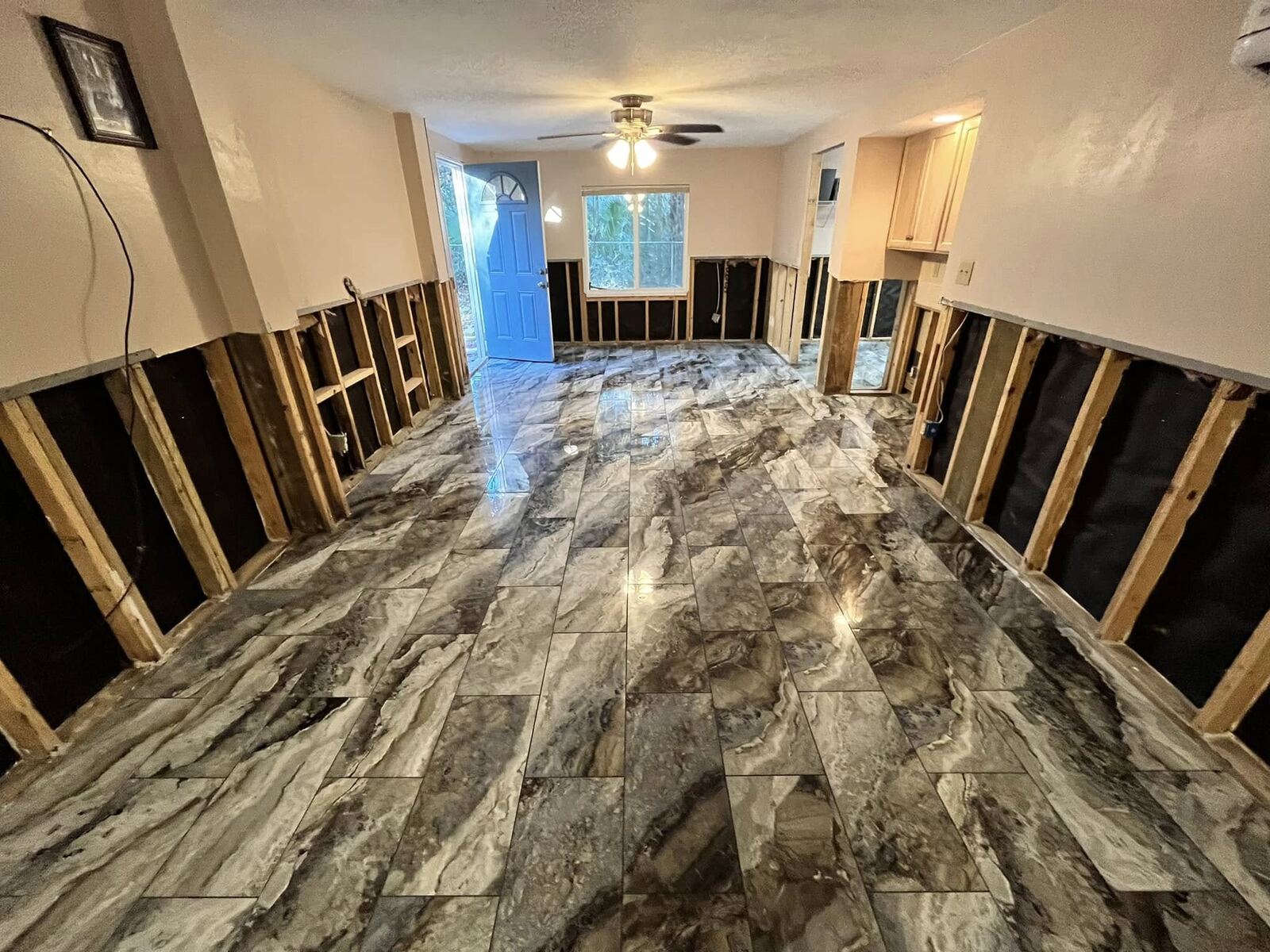Marble-look tile flooring installed during whole-room renovation
