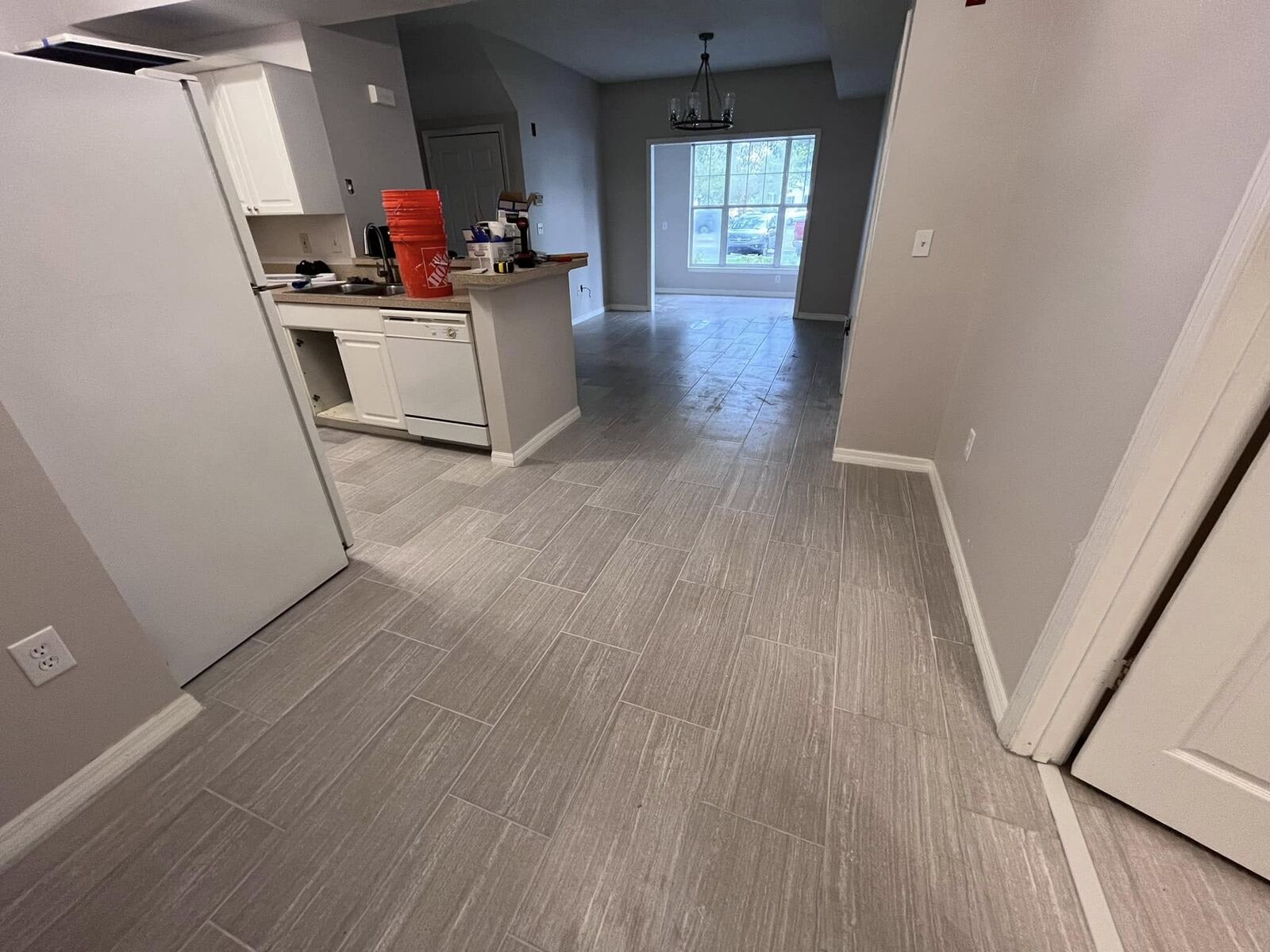Finished wood-look tile flooring, open kitchen