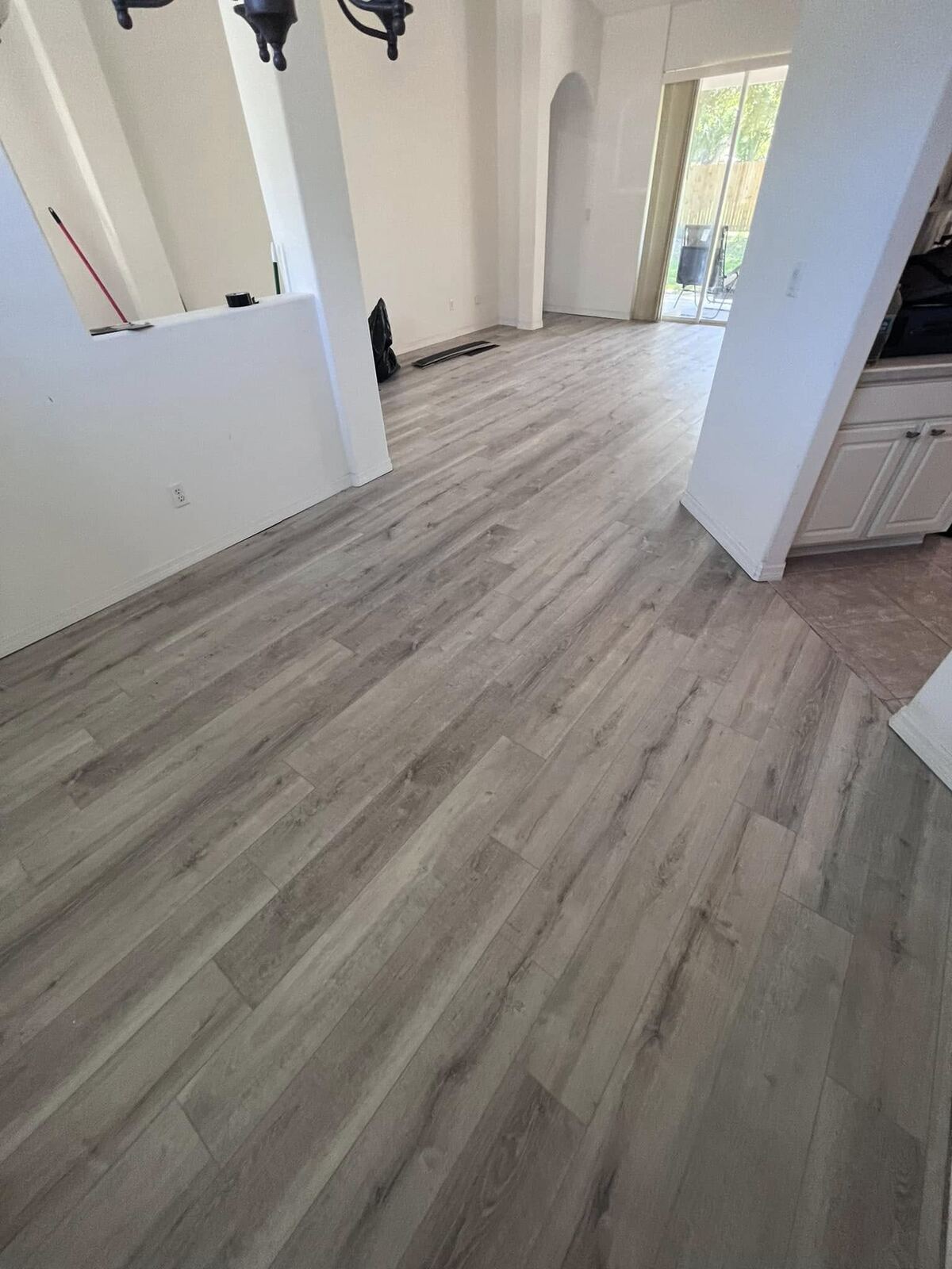 Finished wood-look tile flooring, hallway